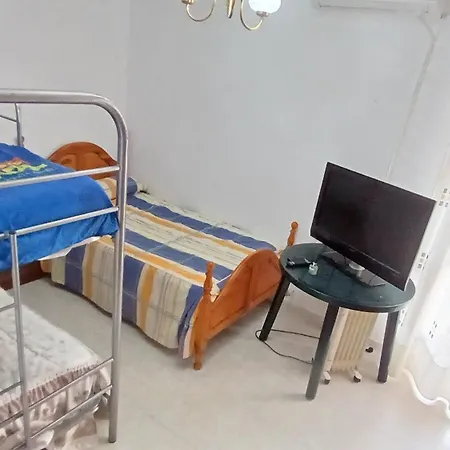 Privada Triple Con Camas Individuales Couette-café